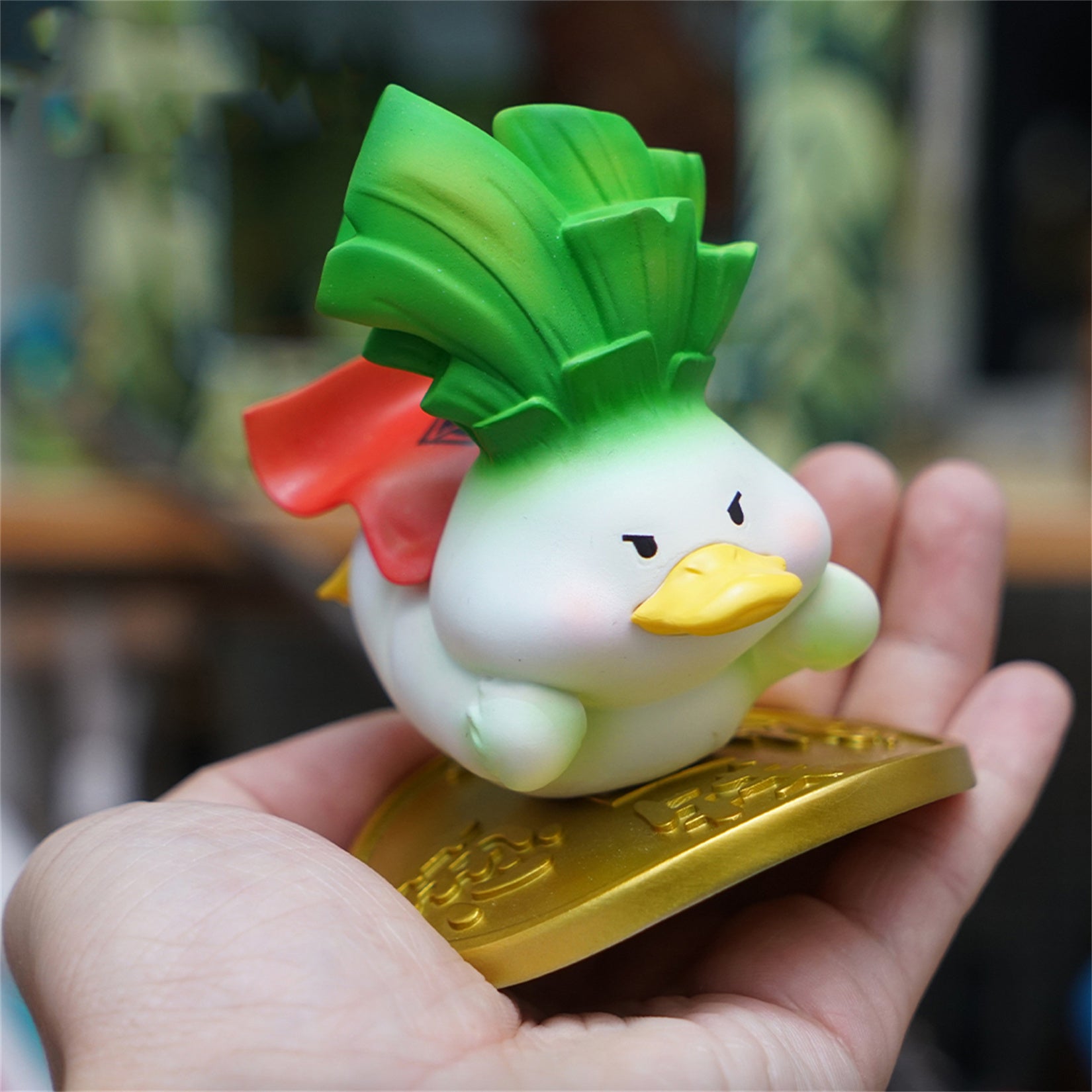 Figurine de canard porte-bonheur en résine