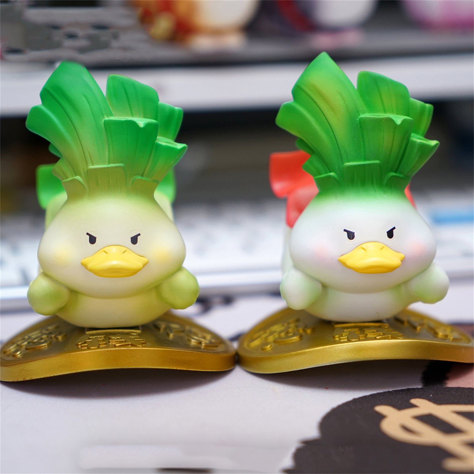 Figurine de canard porte-bonheur en résine