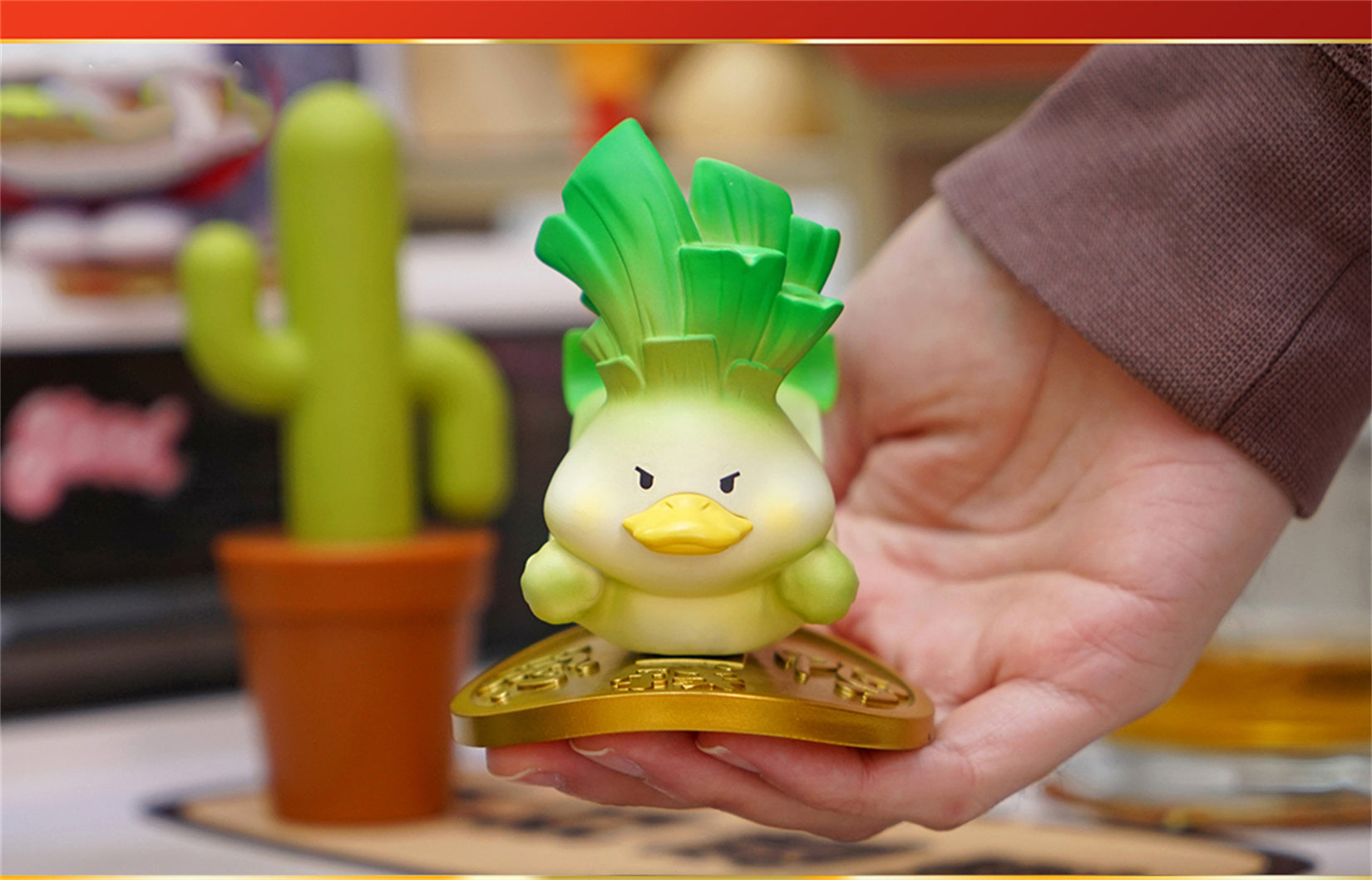 Figurine de canard porte-bonheur en résine 